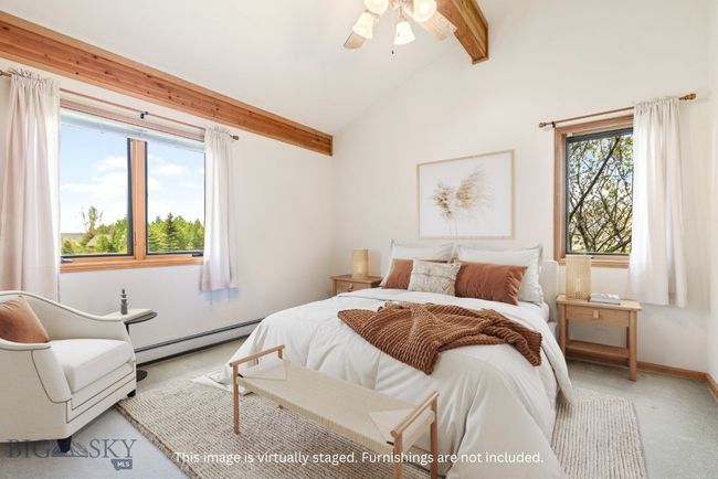 Second bedroom on main level. This image has been virtually staged. | Image 29