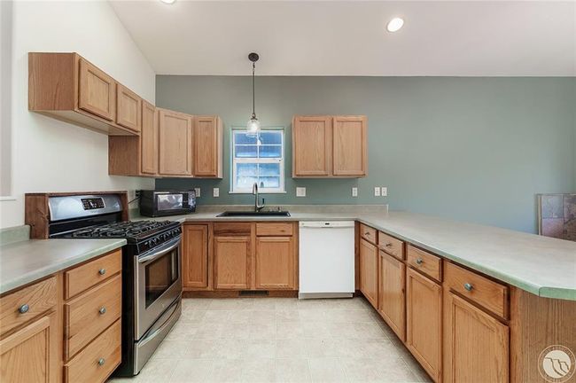 Kitchen with gas oven/stove. | Image 5