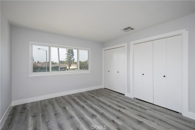 Another view of largest bedroom. | Image 16