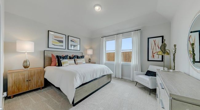 Bedroom with light carpet and baseboards | Image 12