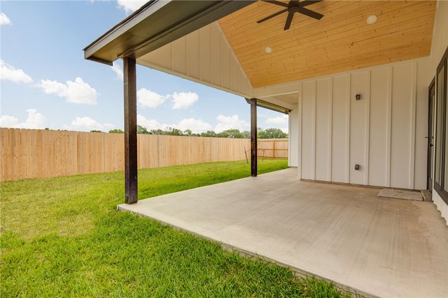 View of yard featuring a patio area and a ceiling fan | Image 33