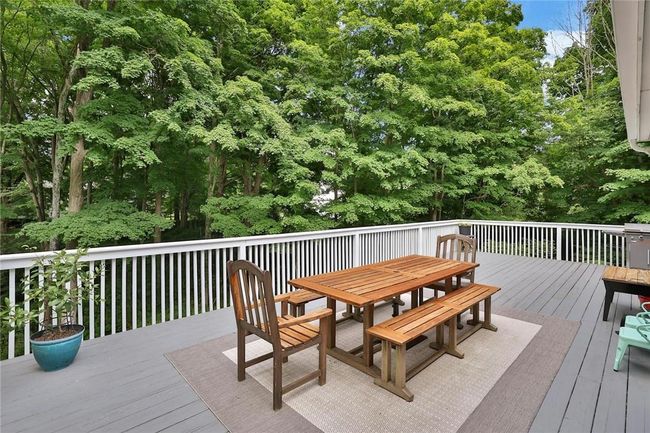 Fabulous deck overlooking the babbling brook. Imagine having your morning coffee out here in your own private sanctuary? | Image 28