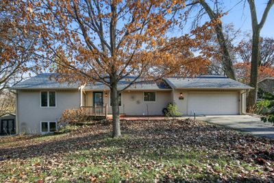 Excellent Burnsville location! One level home with 4 beds, 2 bath, 2 car garage and additional spancrete garage below the 2 car garage | Image 1