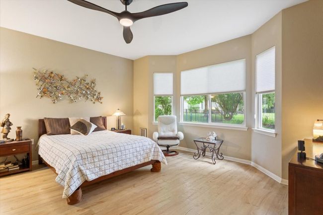 Bay window in primary room, updated ceiling fan | Image 18