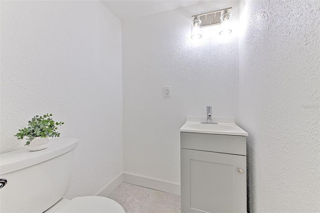 Downstairs hallway half bathroom | Image 5