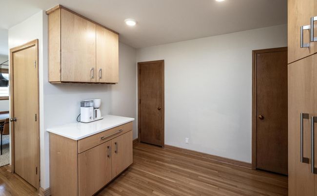 Center door opens to additional storage. | Image 7