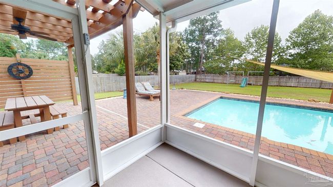 7445 Brevard St, House other with 4 bedrooms, 3 bathrooms and 6 parking in Navarre FL | Image 31