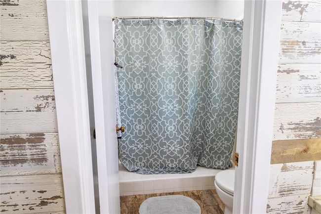 Primary bath with step-in tub. | Image 28