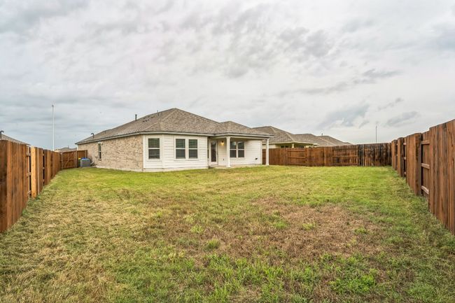 Back of house featuring a fenced backyard | Image 15