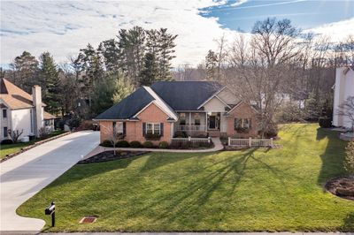 Aerial front plenty of curb appeal, new cement drive, fresh landscaping. | Image 2