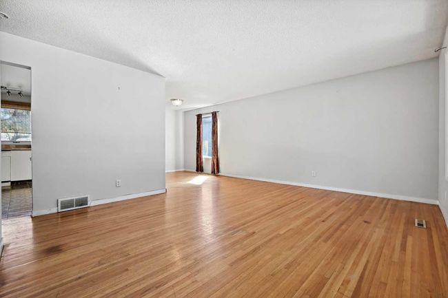 111 Allandale Close Se, House other with 3 bedrooms, 3 bathrooms and 2 parking in Calgary AB | Image 5