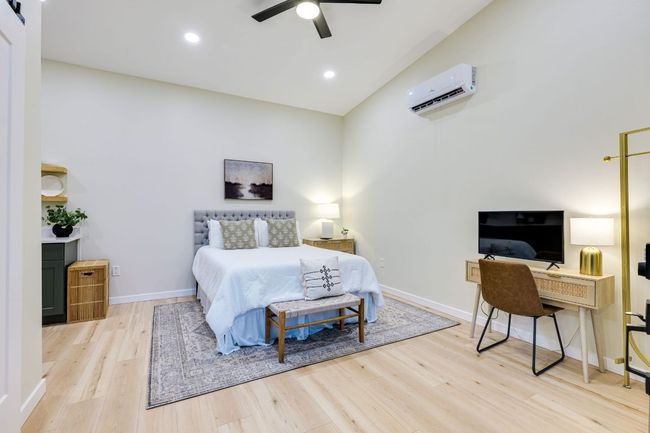 There's plenty of space for bedroom furniture and a work station. | Image 37