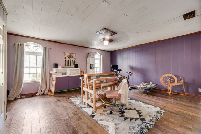 Office area with crown molding, visible vents, and hardwood / wood-style floors | Image 20