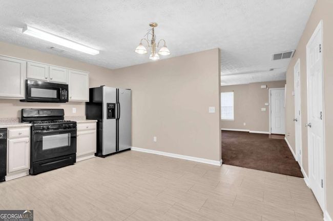 5566 Pineridge Ct, Townhouse with 3 bedrooms, 3 bathrooms and 2 parking in Forest Park GA | Image 9