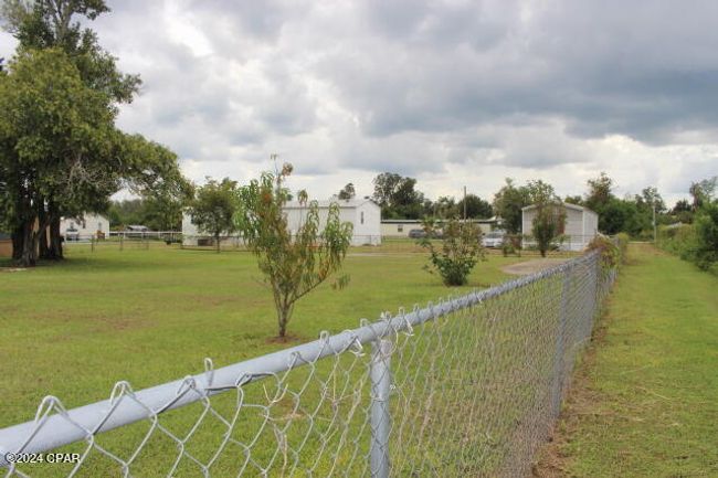 25676 Ne Evans St, House other with 3 bedrooms, 2 bathrooms and null parking in Altha FL | Image 10