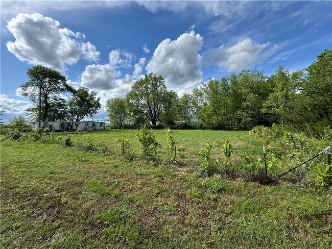 Drive Way and Fenced Section to the ight of Driveway. | Image 32