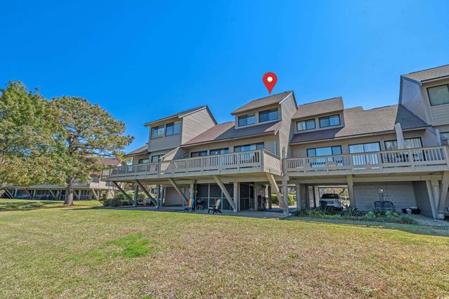 Back of property with a lawn and a wooden deck | Image 32