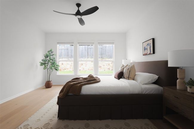 High ceilings and neutral paint create a serene primary suite. | Image 18