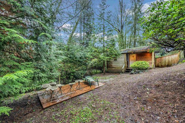 View of yard featuring a deck | Image 31