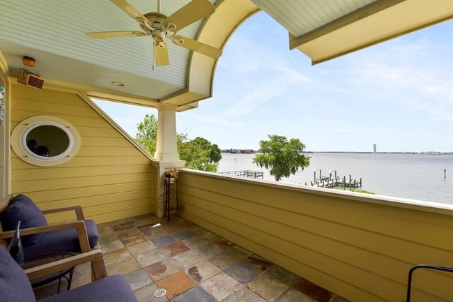 Enjoy stunning sunset views from the upper deck, perfect for relaxation and unwinding. | Image 39