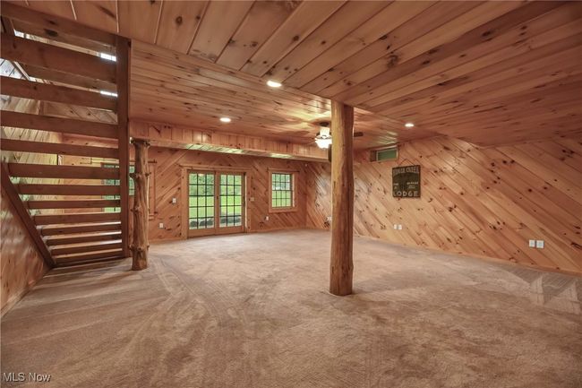 Alternate view of rec room toward slider and back of property | Image 33
