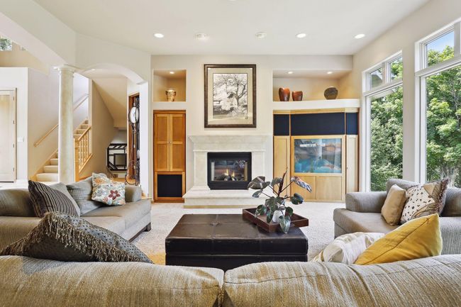 Wonderful living room with entertainment, built-ins, cozy 2-sided fireplace! | Image 15