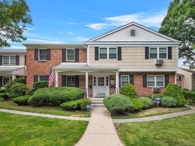 View of front of house featuring a front yard and a porch | Image 1