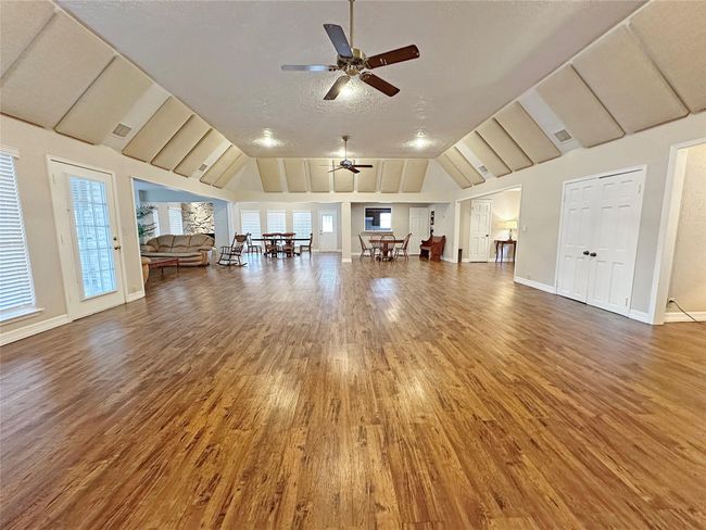 Variety of tables and cushion fold chairs convey with rentals. | Image 40