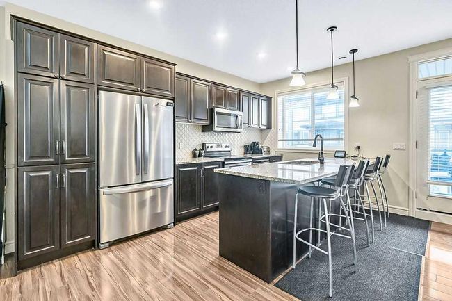 237 Savanna Walk Ne, Townhouse with 3 bedrooms, 3 bathrooms and 2 parking in Calgary AB | Image 4