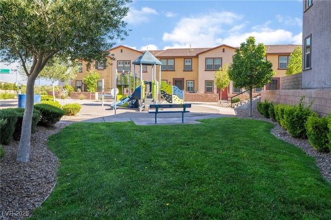 Community jungle gym featuring a yard | Image 40