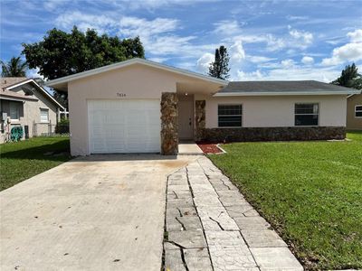 7614 Sw 8th Ct, House other with 3 bedrooms, 2 bathrooms and null parking in North Lauderdale FL | Image 3