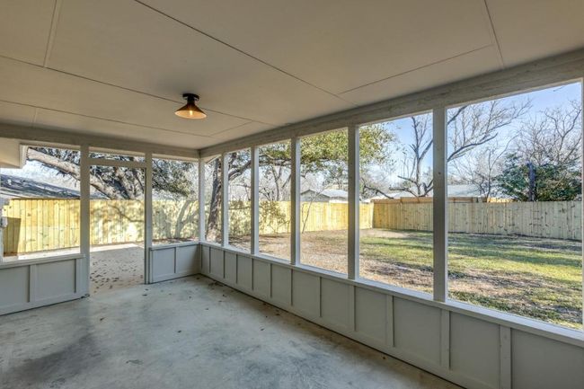 View of unfurnished sunroom | Image 23