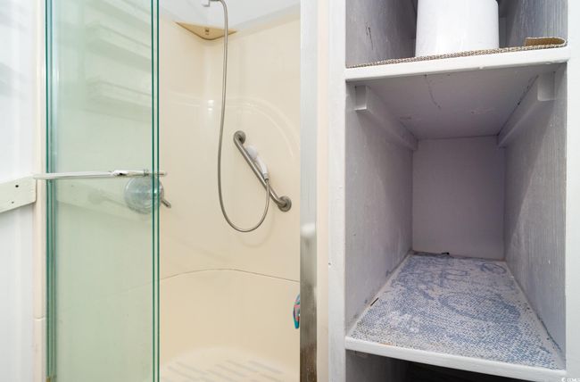 Bathroom featuring walk in shower | Image 12