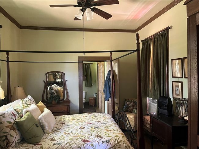 Lower floor bedroom, featuring ornamental molding | Image 22
