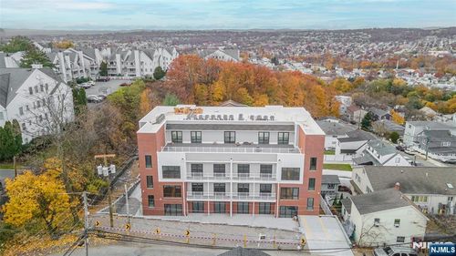 318 Dixon Ave, Paterson, NJ, 07501-3380 | Card Image