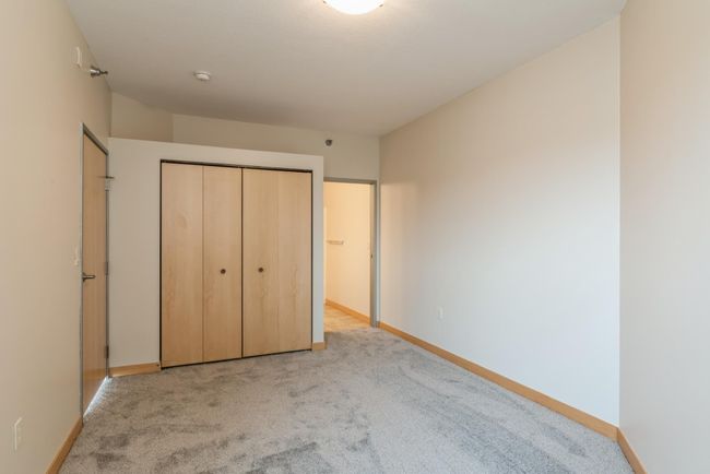All 4 bedrooms are nicely sized and have large closets too. (The photos are of unit 401. Owned by the same person and finishes that are VERY similar) | Image 10
