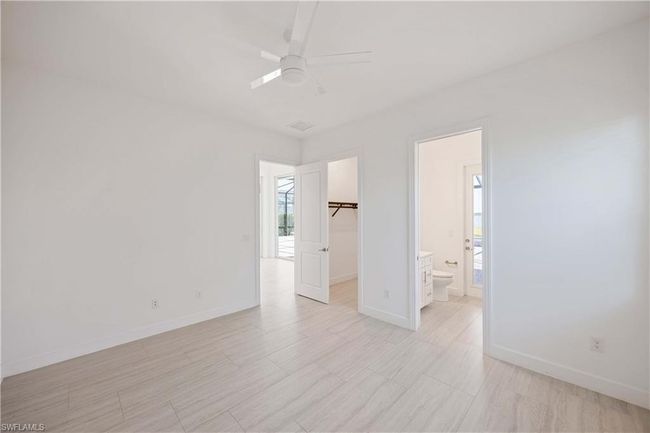 Empty room with baseboards and a ceiling fan | Image 18
