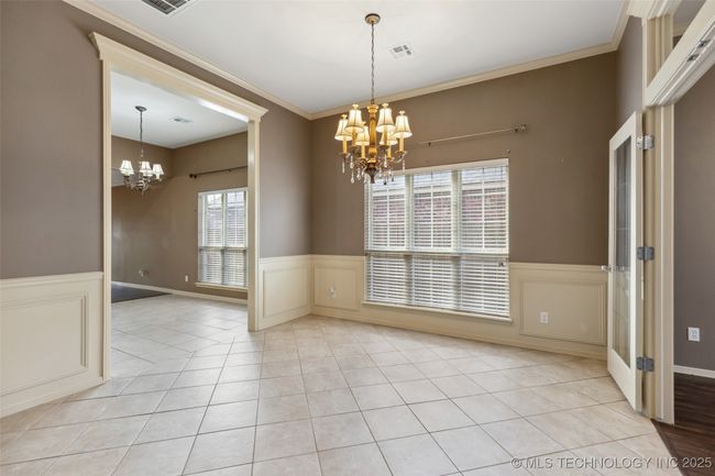 Dining area looking into kitchen area | Image 4