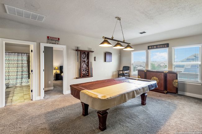 An elegantly appointed game room, thoughtfully des | Image 27