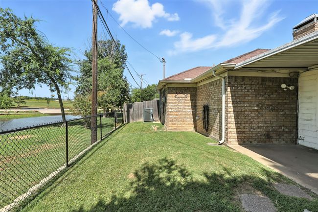 View of yard featuring a water view | Image 8