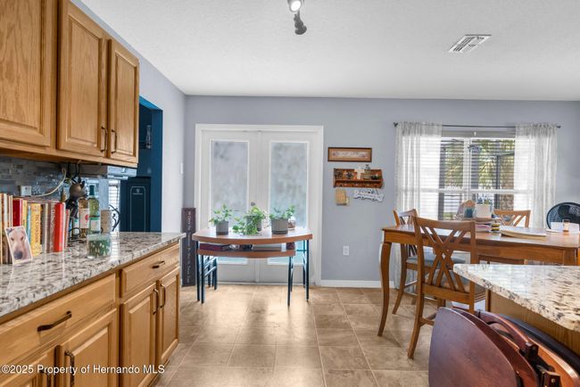 10457 Cranston St, House other with 5 bedrooms, 2 bathrooms and null parking in Spring Hill FL | Image 4