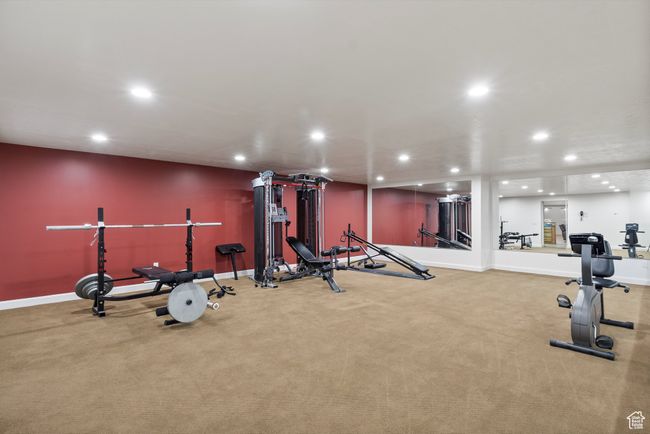 Exercise area with recessed lighting, baseboards, and carpet | Image 63
