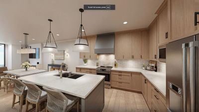 Elegantly designed gourmet kitchen featuring quartz countertops, striking statement lighting, and exquisite custom cabinetry. | Image 3