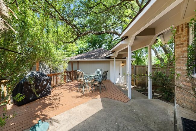 View of patio / terrace featuring outdoor dining space, a wooden deck, and fence | Image 34