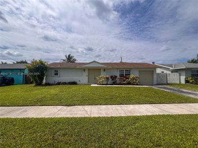 8620 Nw 46th St, House other with 3 bedrooms, 2 bathrooms and null parking in Lauderhill FL | Image 1