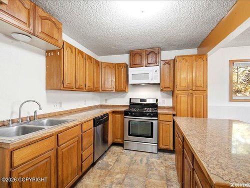621 E 73rd Ave, Anchorage, AK, 99518-2815 | Card Image