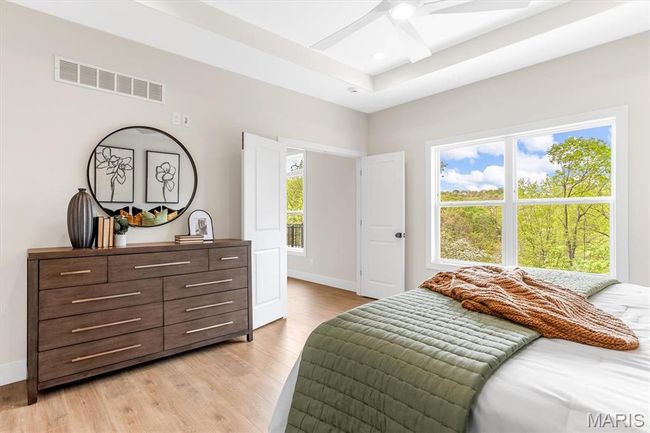 Primary suite with tray ceiling, french doors and beautiful views! | Image 34