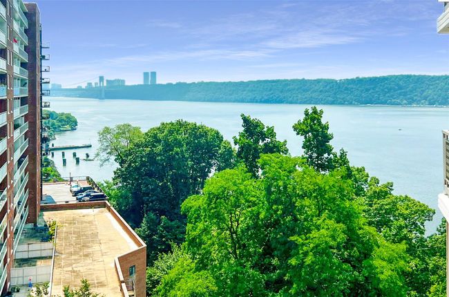 Water view with a notable bridge | Image 7