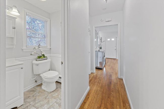 half bathroom with baseboard heating | Image 30