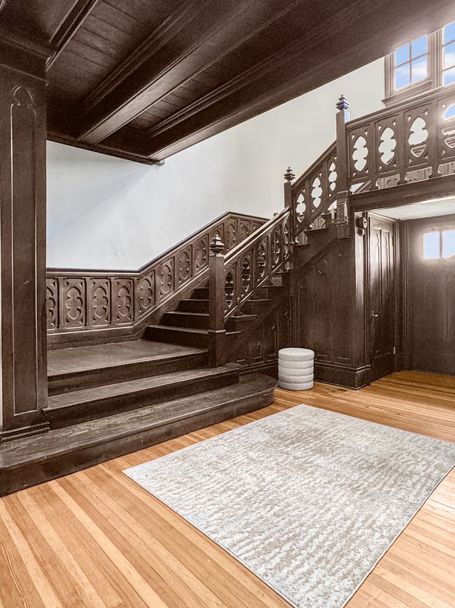 This grand staircase is a striking architectural c | Image 28